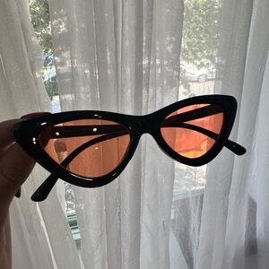 Stylish Black Sunglasses with Orange Lenses